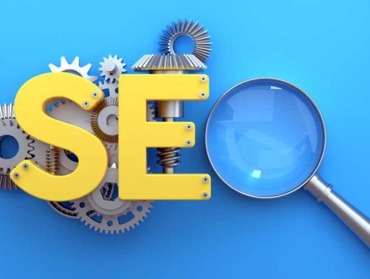 A magnifying glass sits next to the word "SEO," highlighting the importance of keyword research and targeting.